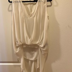 Kenneth Cole ivory sleeveless blouse with 12” long drape in the back.